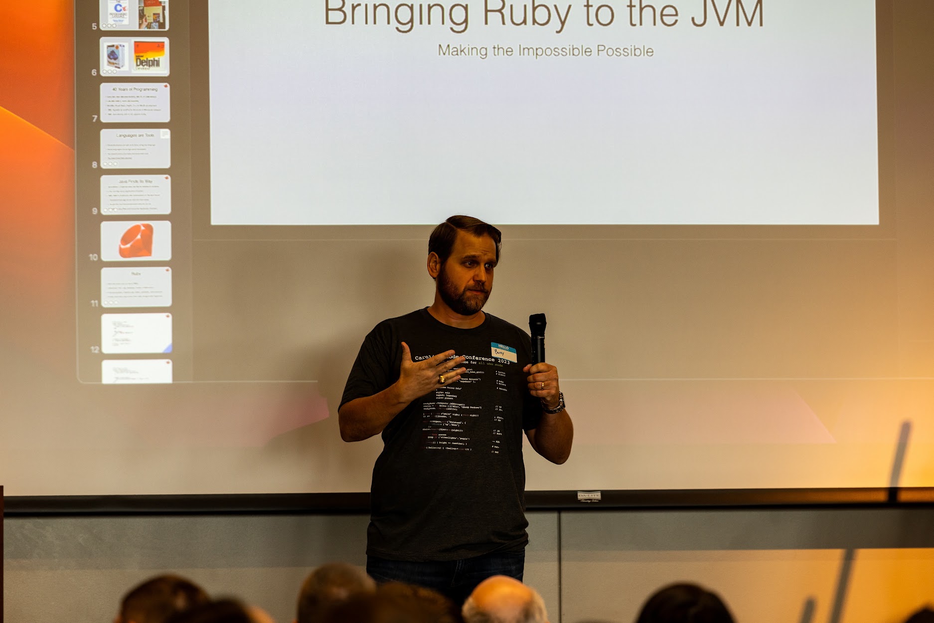 Charles Nutter speaking at the 2023 Carolina Code Conference