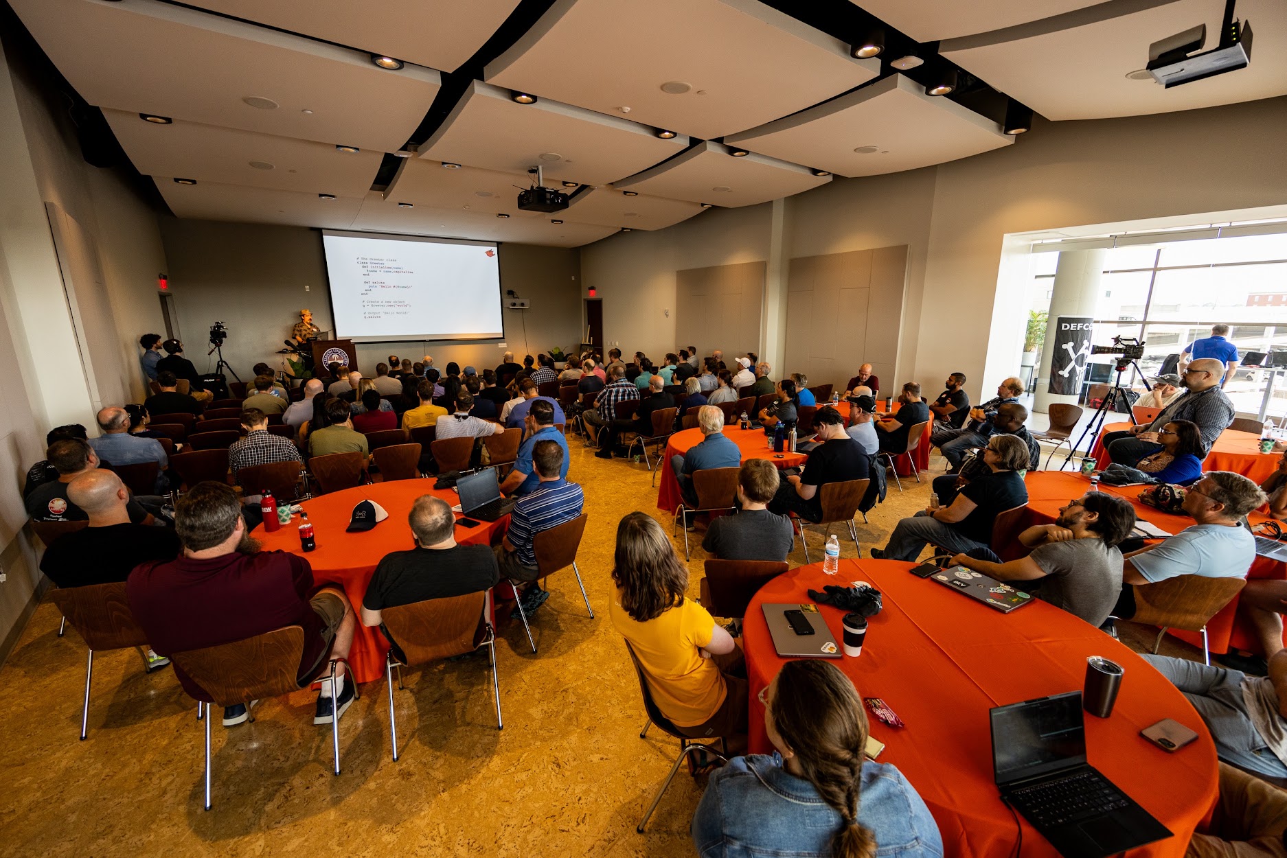Charles Nutter speaking at the 2023 Carolina Code Conference