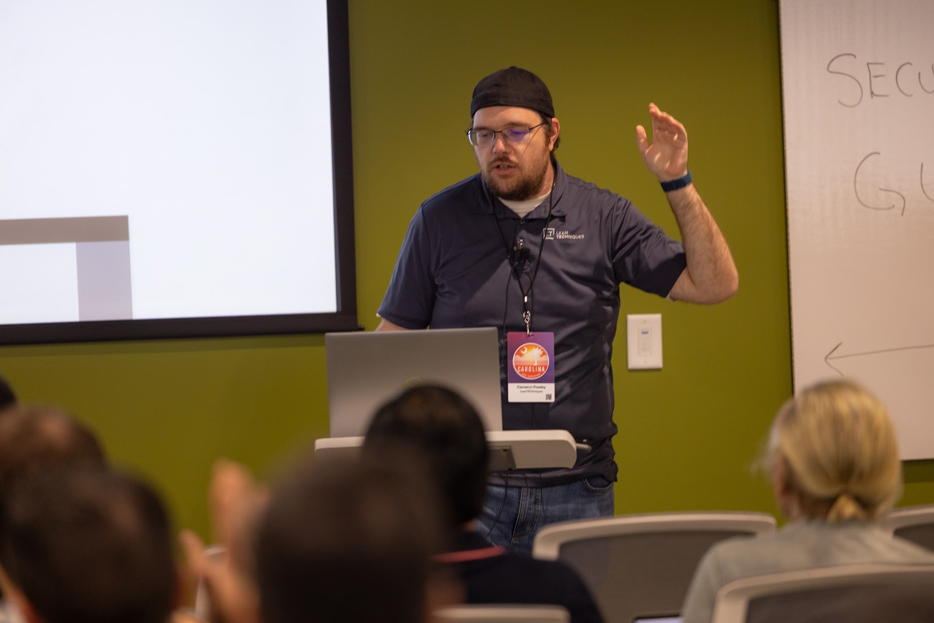 Cameron Presley speaking at the 2024 Carolina Code Conference