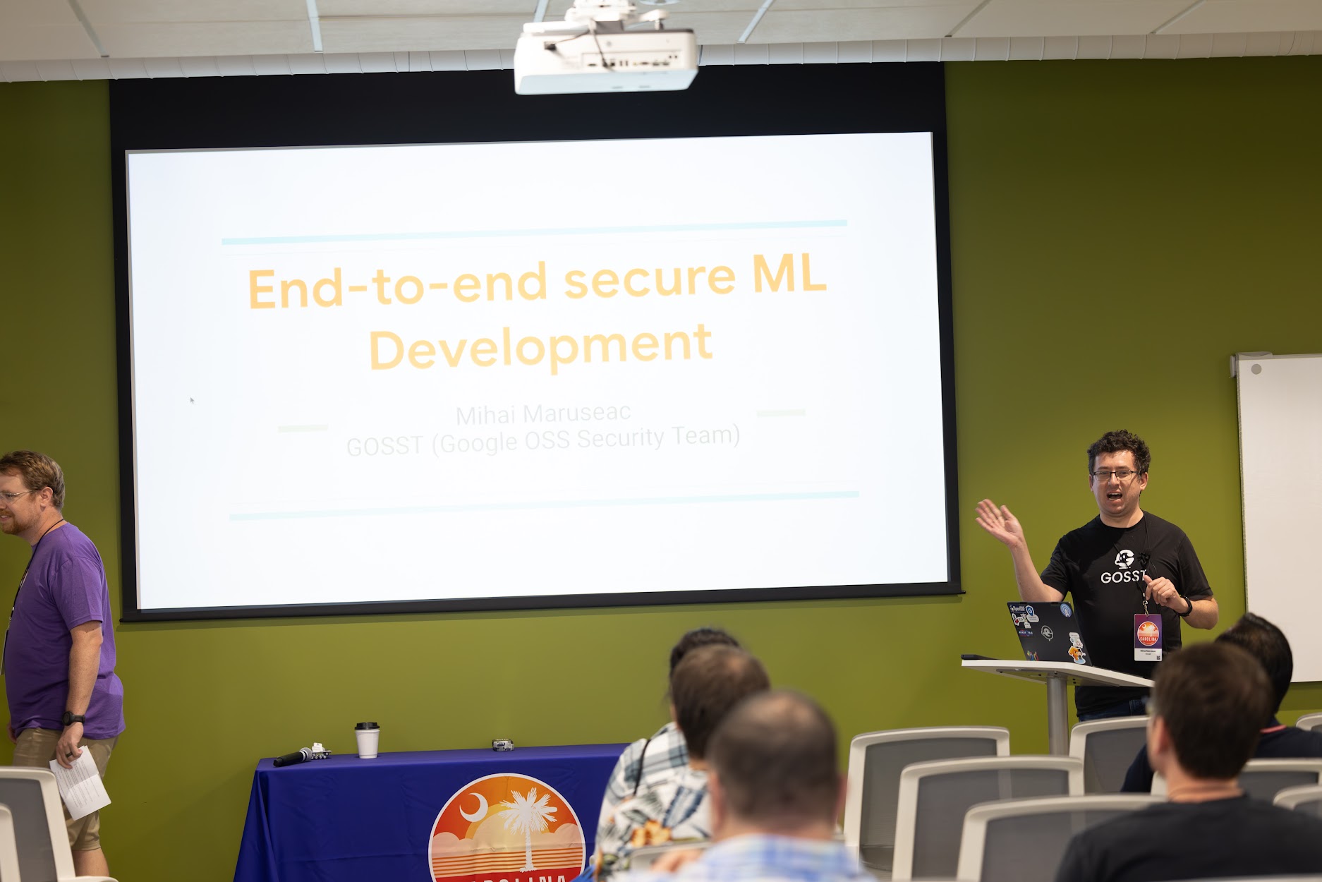 Mihai Maruseac speaking at the 2024 Carolina Code Conference