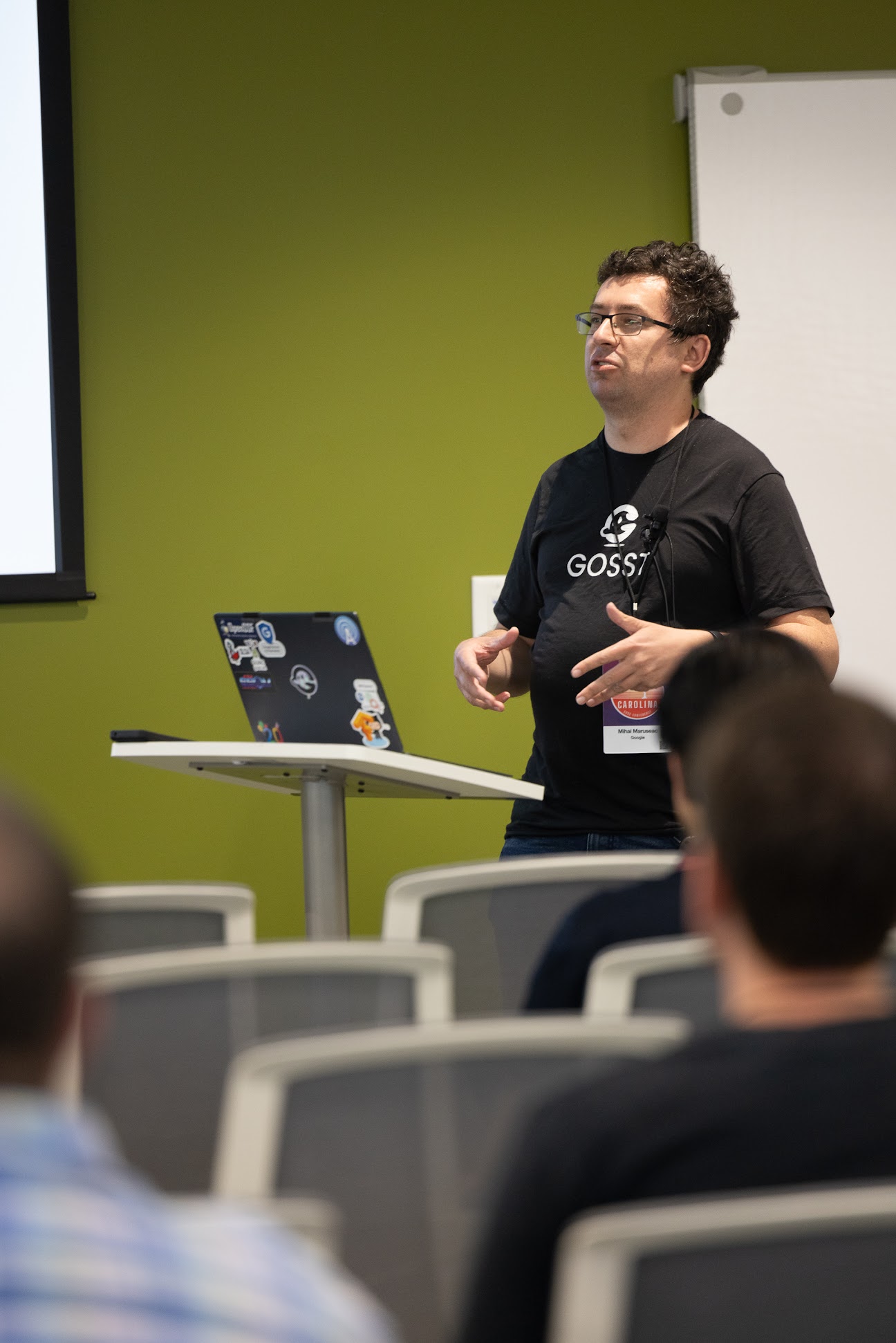 Mihai Maruseac speaking at the 2024 Carolina Code Conference
