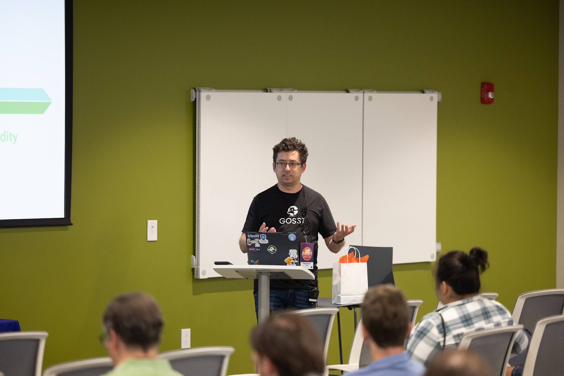 Mihai Maruseac speaking at the 2024 Carolina Code Conference