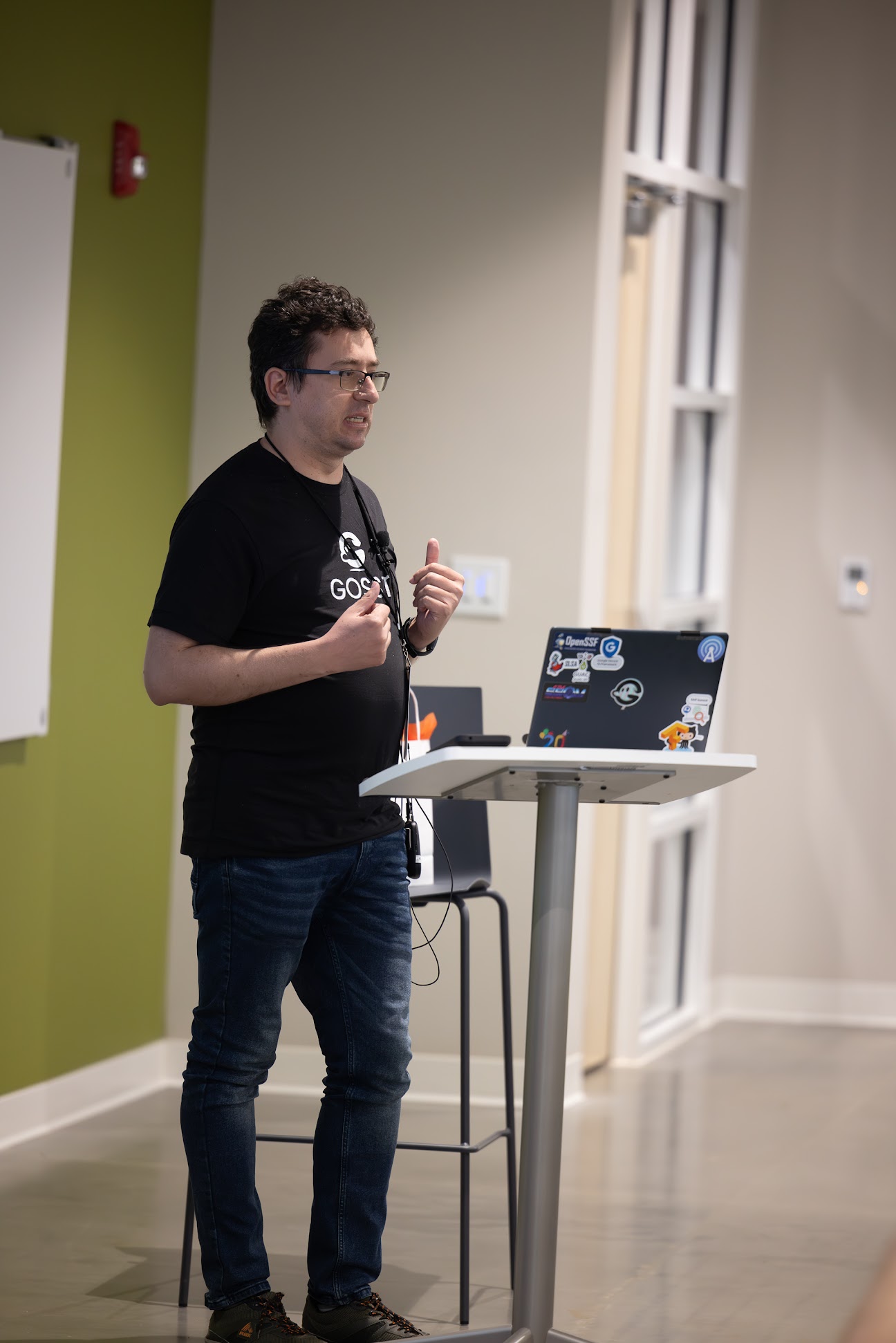 Mihai Maruseac speaking at the 2024 Carolina Code Conference