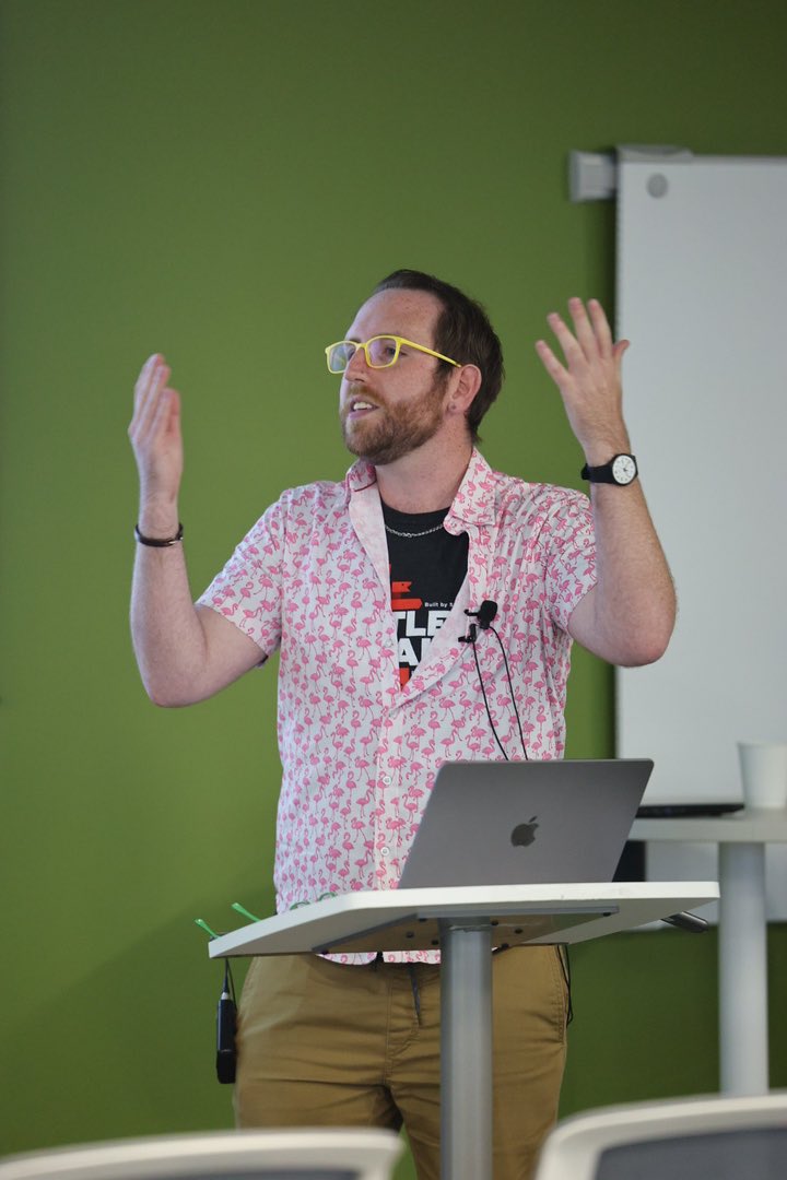 Andrew MacLean speaking at the 2025 Carolina Code Conference