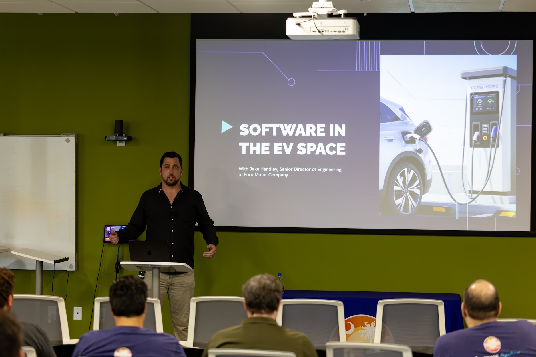 Jake Hendley speaking at the 2025 Carolina Code Conference
