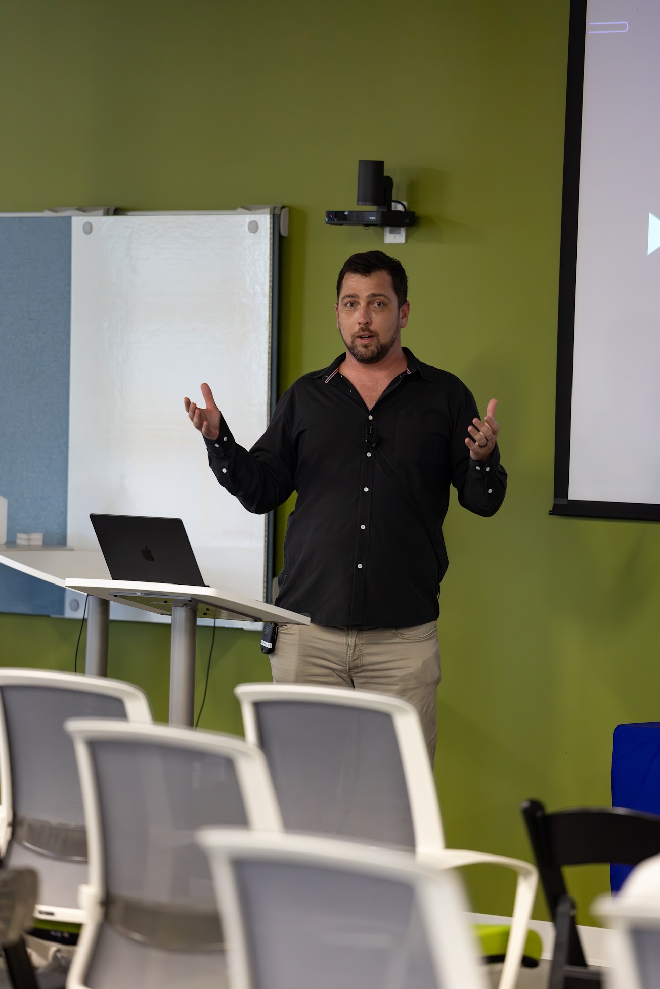 Jake Hendley speaking at the 2025 Carolina Code Conference