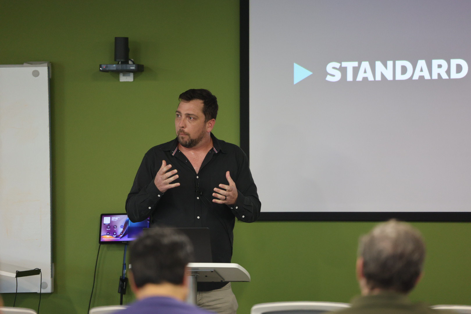 Jake Hendley speaking at the 2025 Carolina Code Conference
