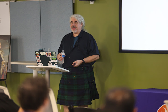 Matt "Kelly" Williams speaking at the 2025 Carolina Code Conference