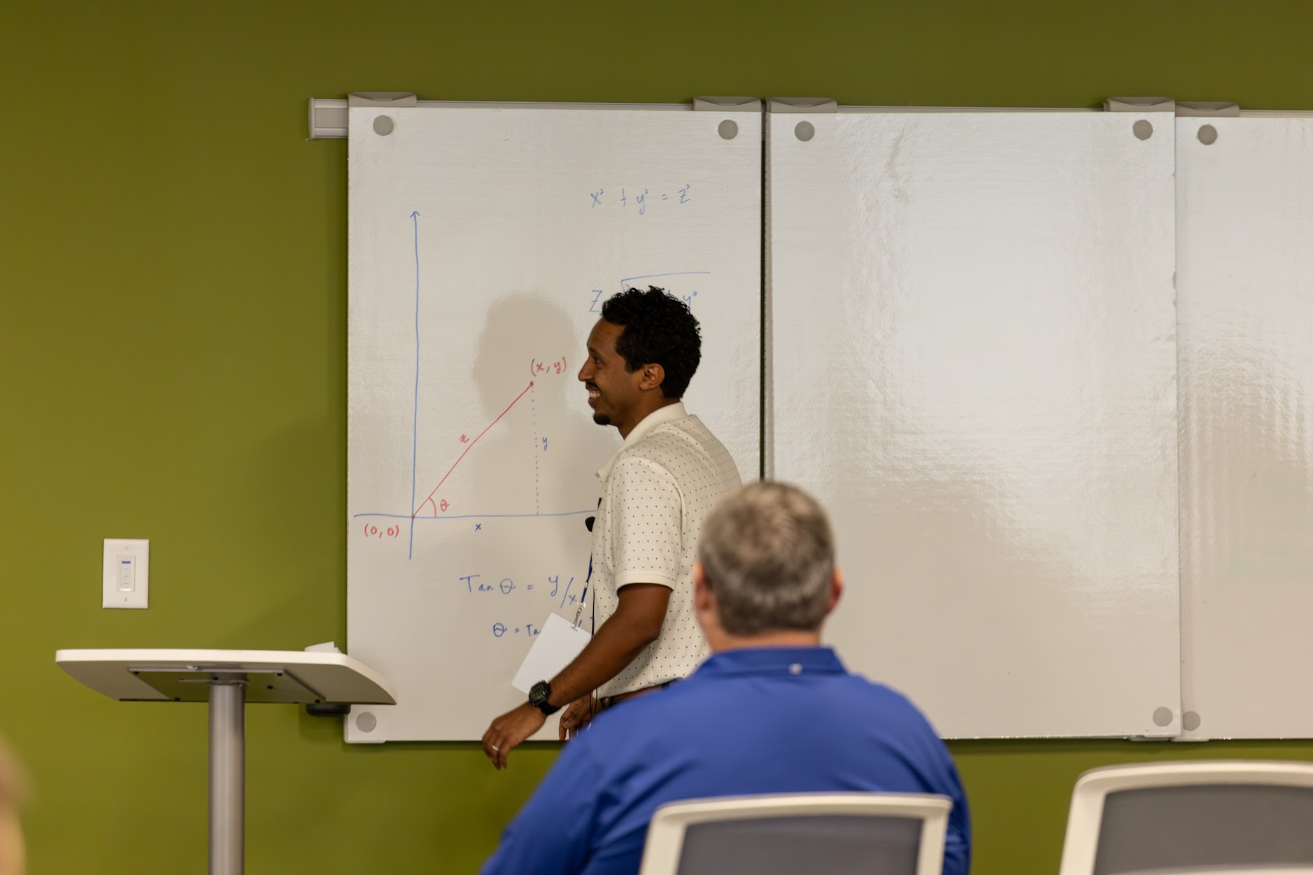 Nate Argaw speaking at the 2025 Carolina Code Conference