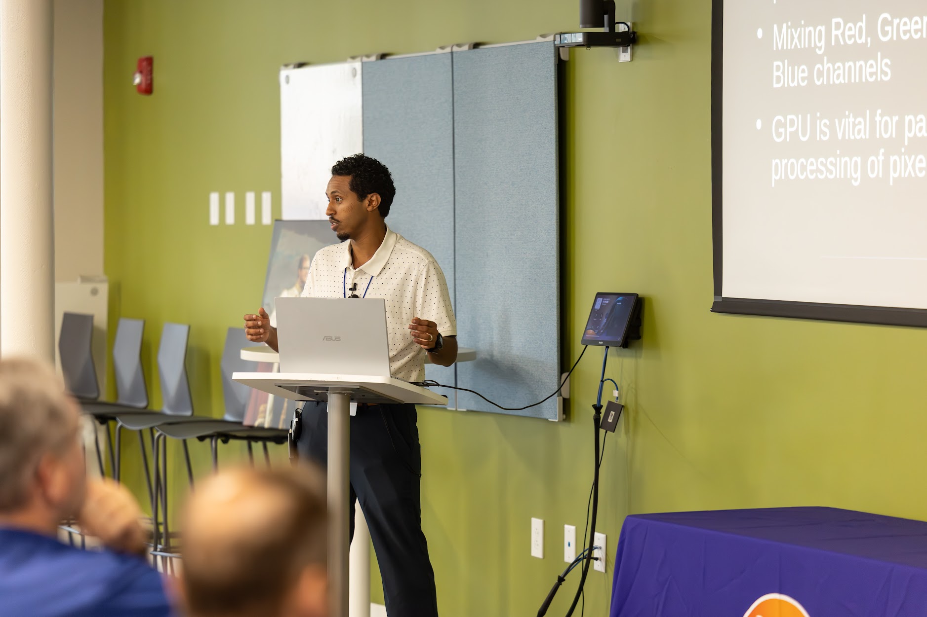 Nate Argaw speaking at the 2025 Carolina Code Conference