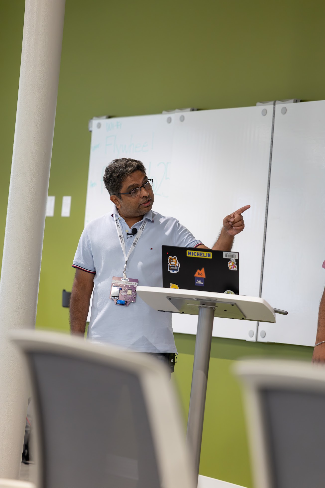 Amit Kulkarni speaking at the 2026 Carolina Code Conference