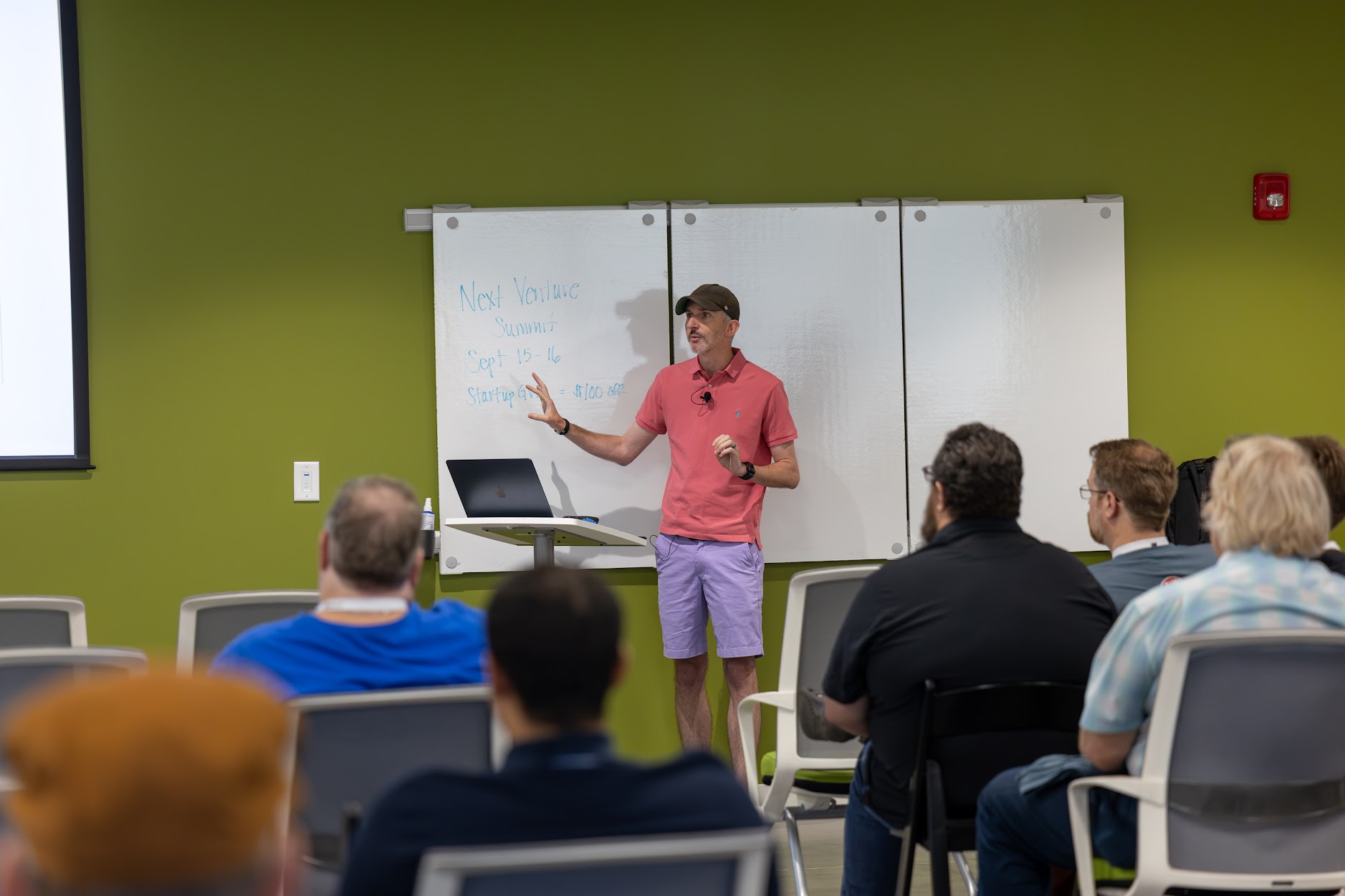 Craig Kerstiens speaking at the 2026 Carolina Code Conference