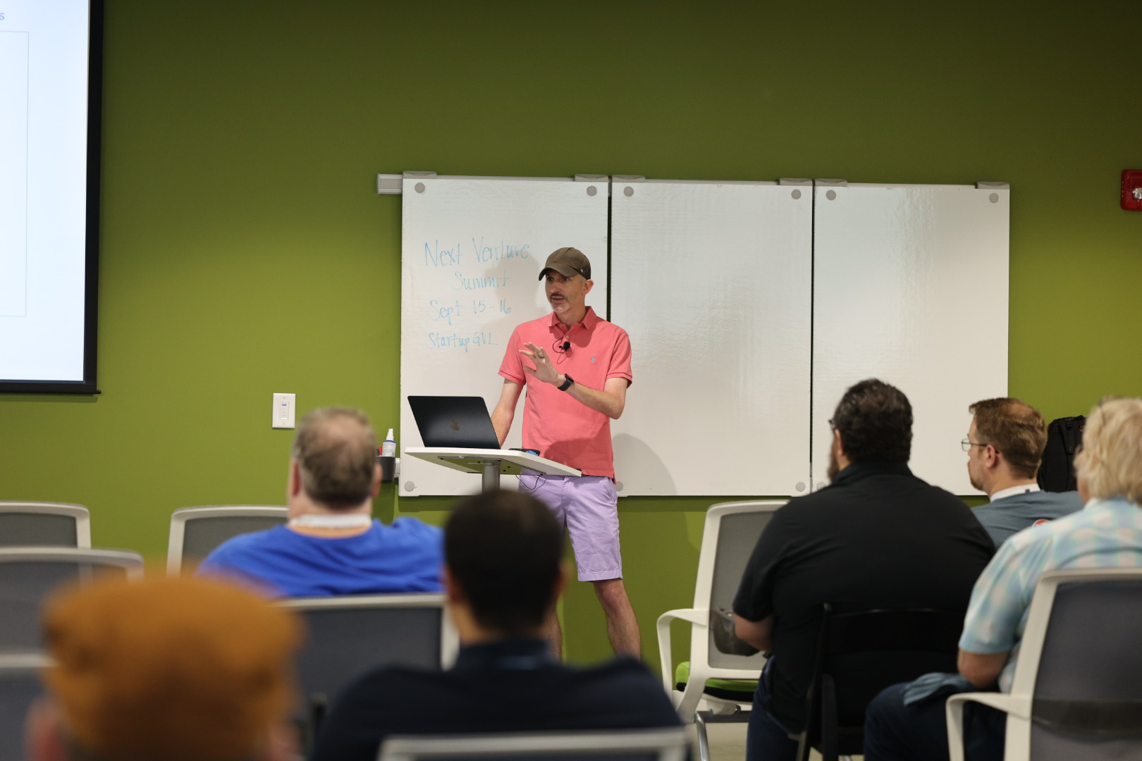 Craig Kerstiens speaking at the 2026 Carolina Code Conference
