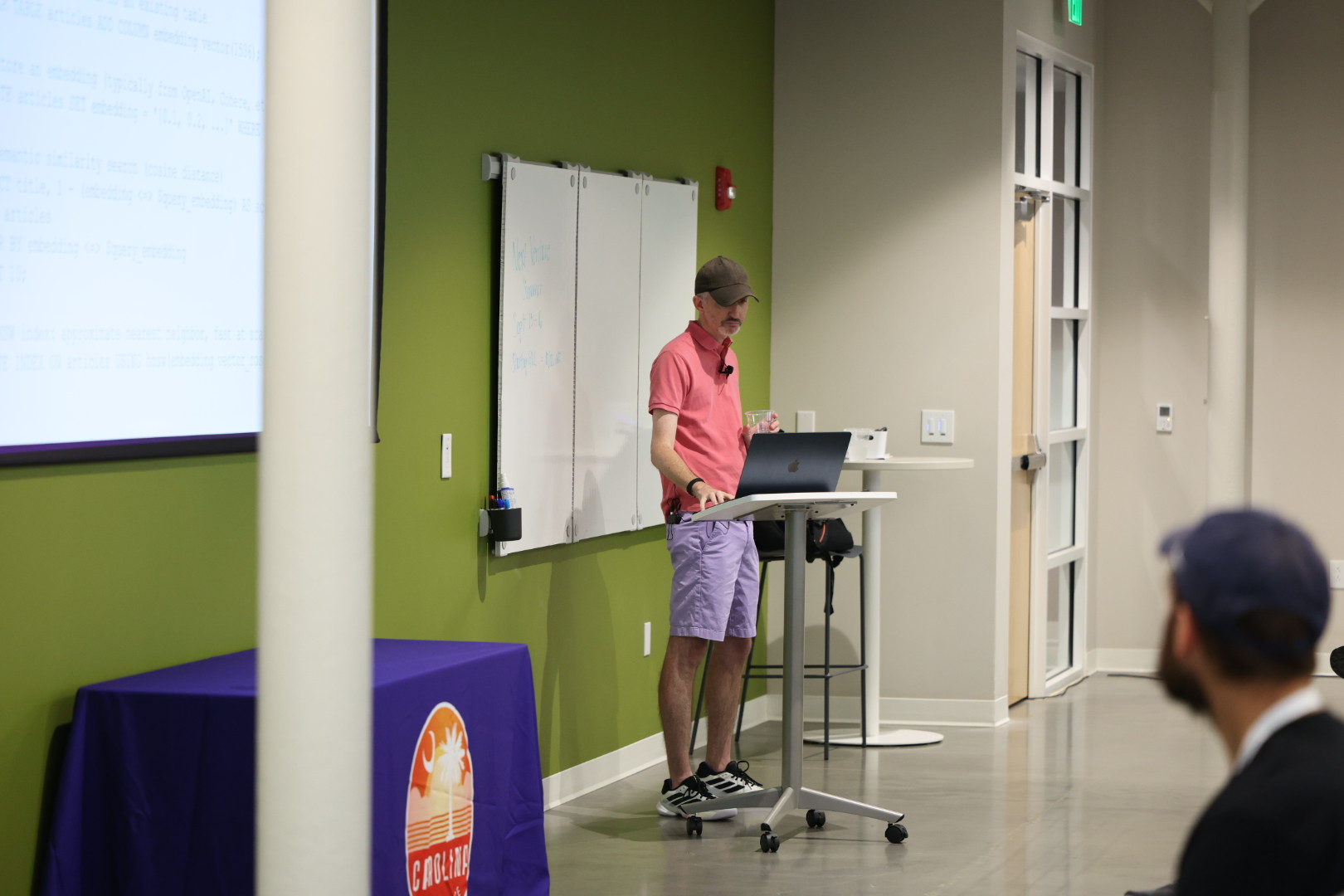 Craig Kerstiens speaking at the 2026 Carolina Code Conference