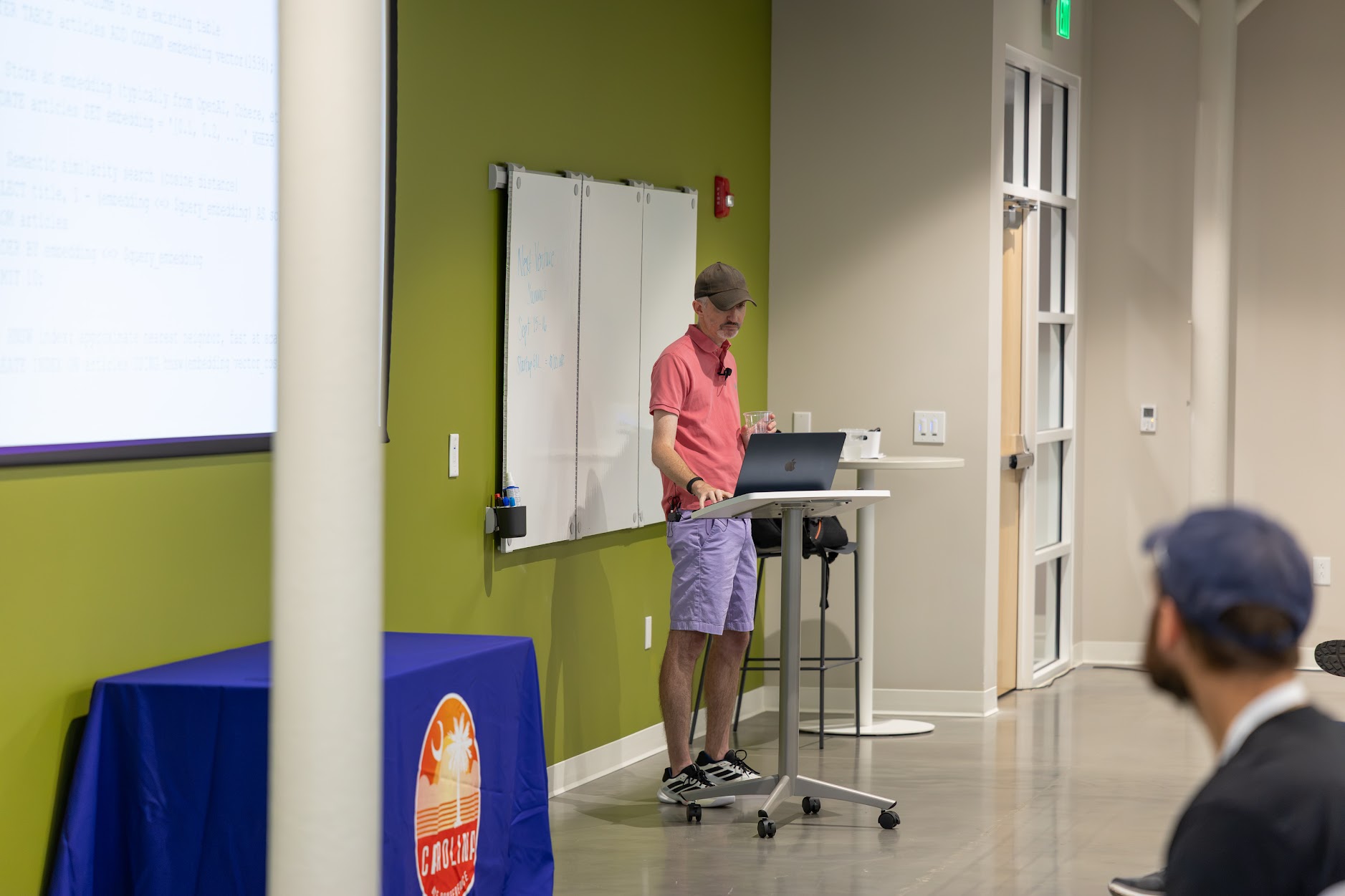 Craig Kerstiens speaking at the 2026 Carolina Code Conference
