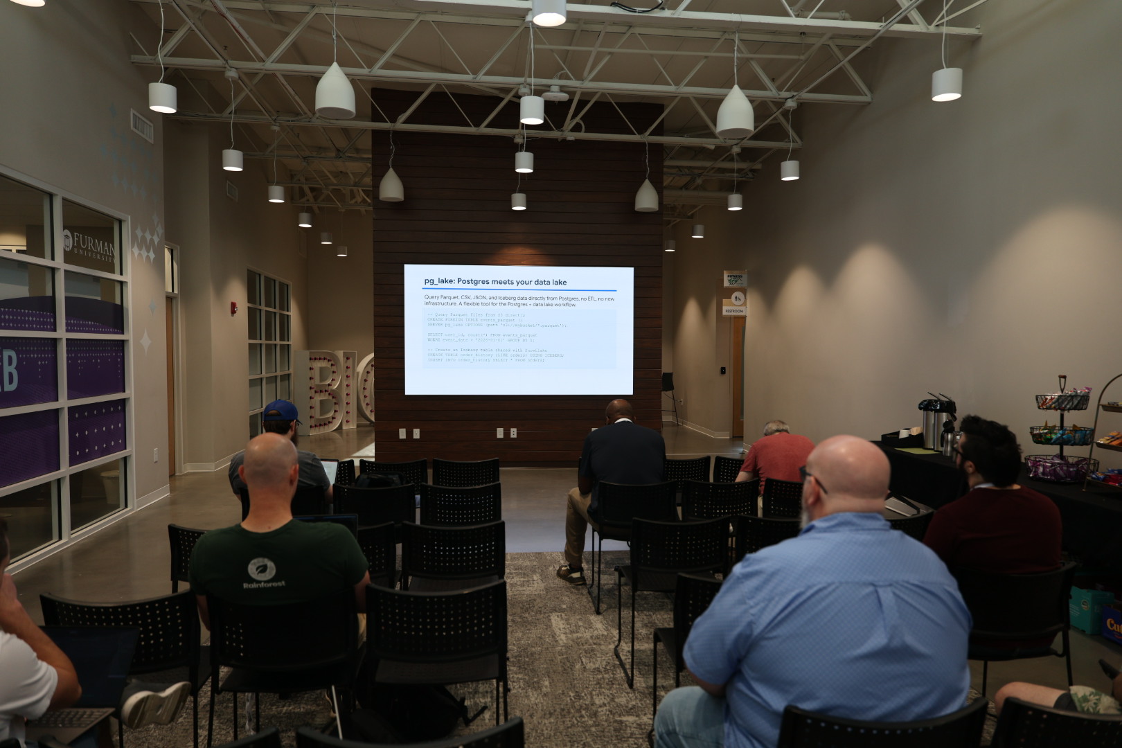 Craig Kerstiens speaking at the 2026 Carolina Code Conference