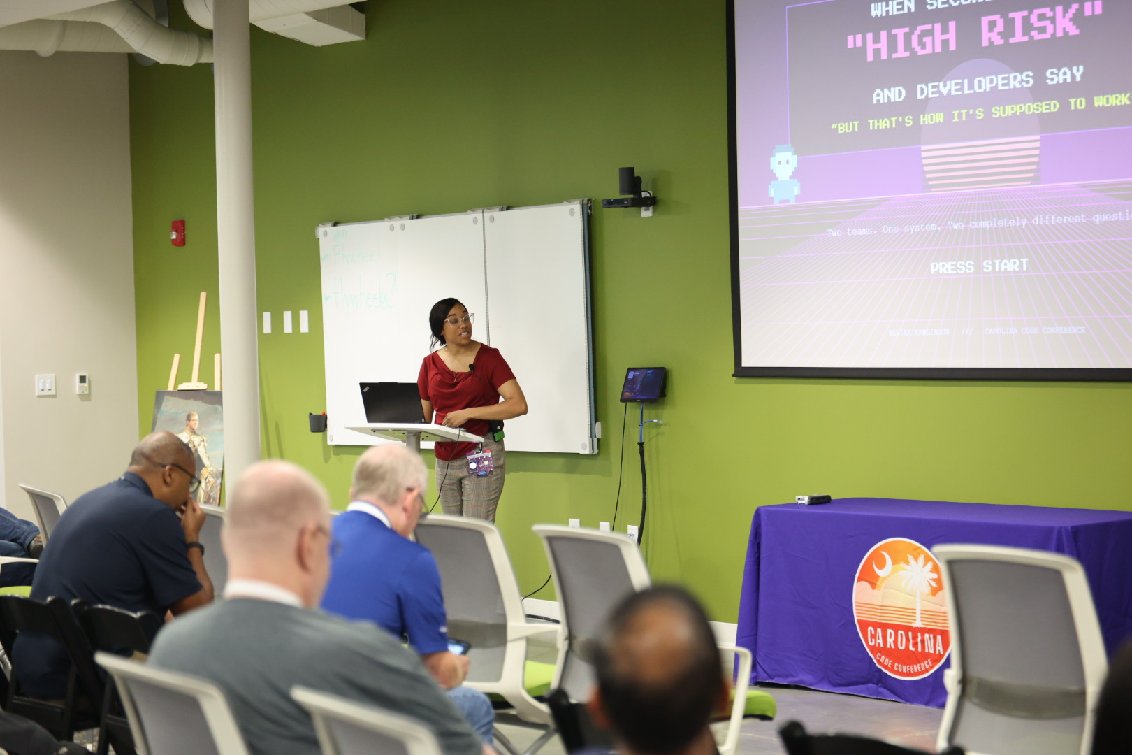 Neviar Rawlinson speaking at the 2026 Carolina Code Conference